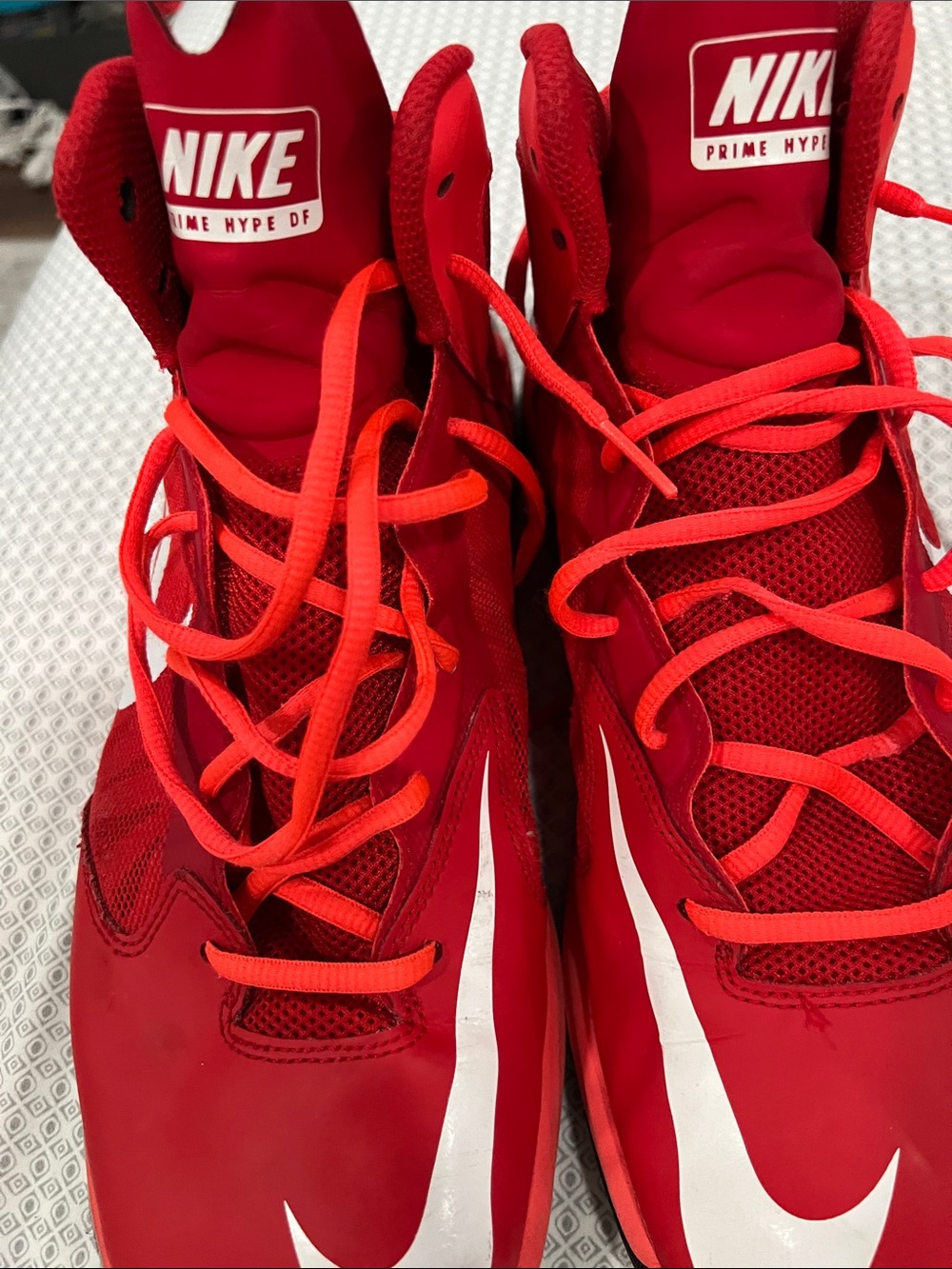 Nike Red High-Top Sneakers with White Swoosh Accents